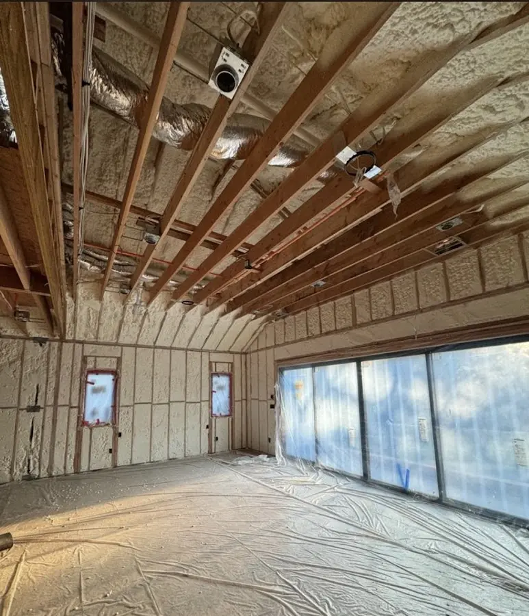 Interior walls and ceiling insulated with spray foam during new construction in Covedale